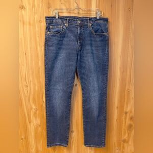 Women's Levi's 502 Dark Blue Straight Jeans, Size 33